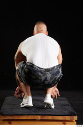 Whole Body Man White Sports Shorts Muscular Kneeling Top Studio photo references